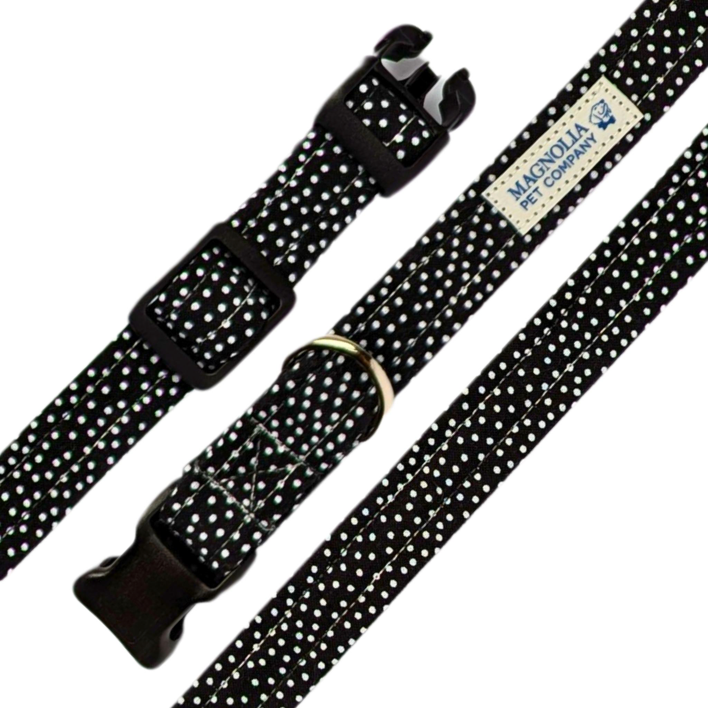 features a classic black background adorned with whimsical white polka dots