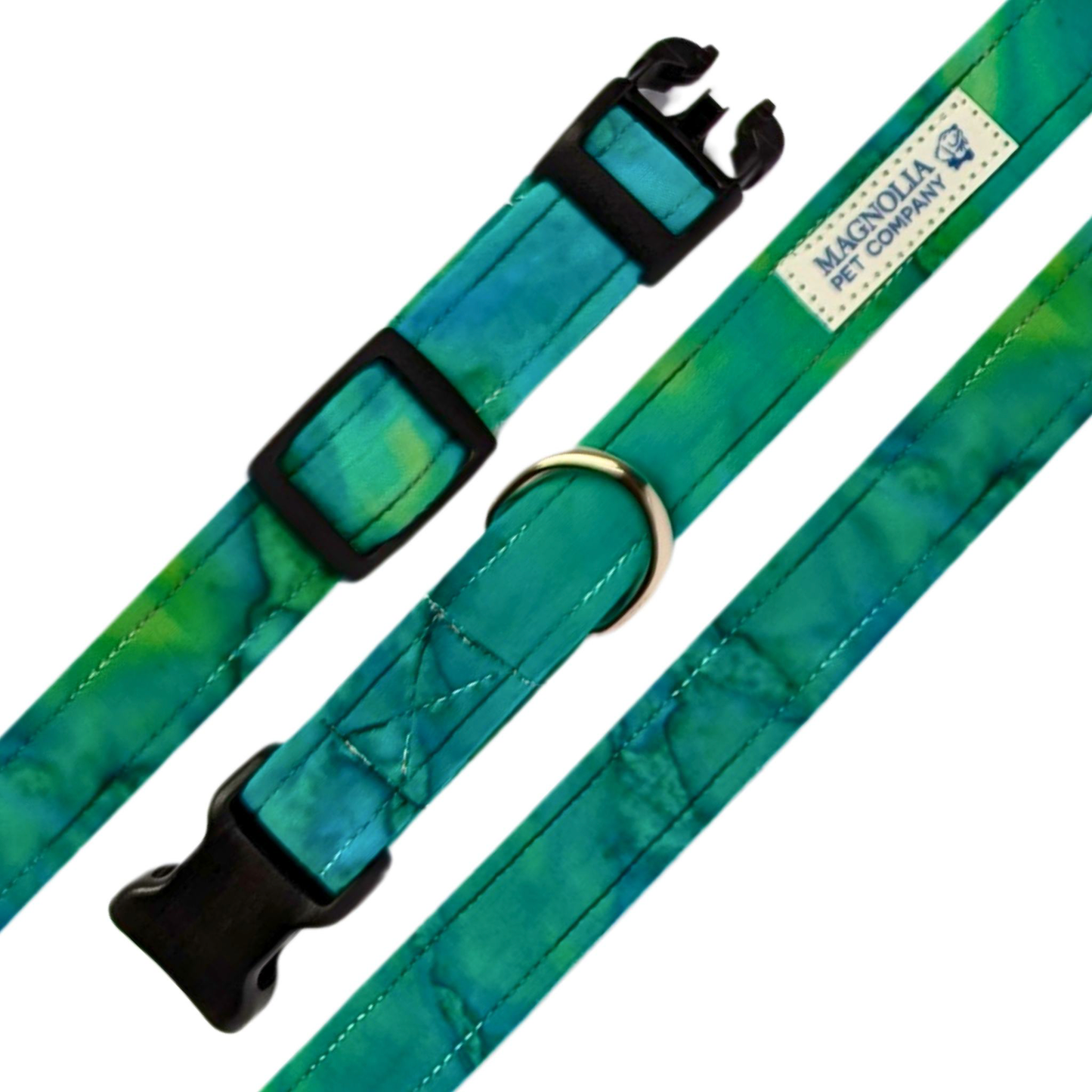 Featuring a stunning watercolor batik design in rich emerald and aqua hues