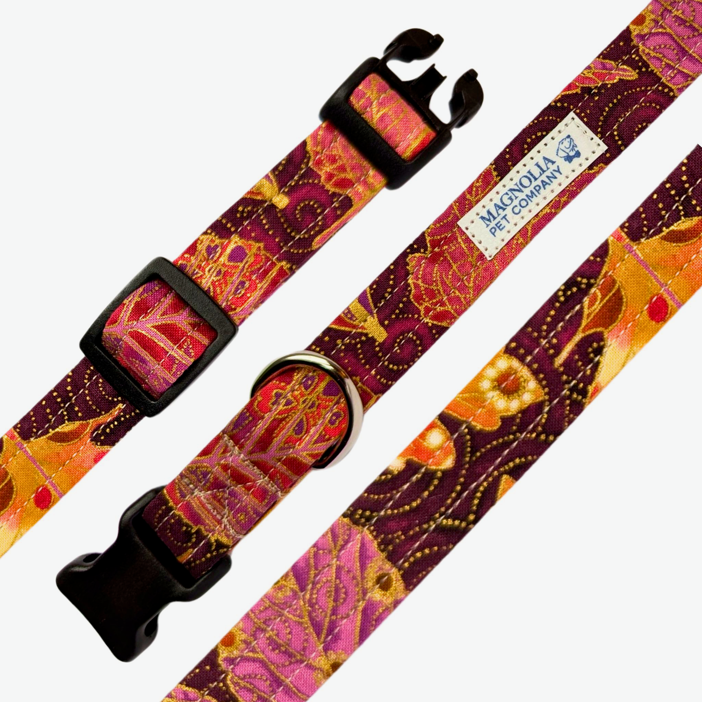 This collar features vibrant jewel tones, including rich emeralds, deep sapphires, and luxurious rubies, all adorned with a stunning pattern of fall leaves