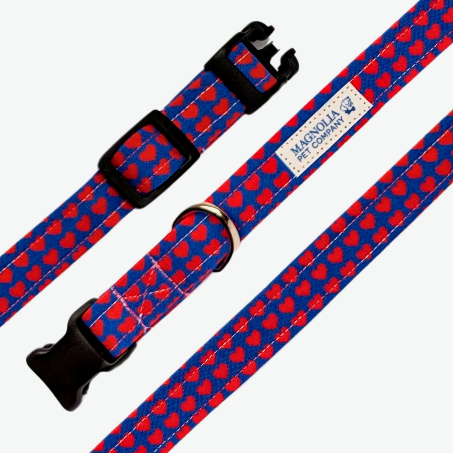 This navy collar is adorned with bright red hearts, adding a playful and loving touch
