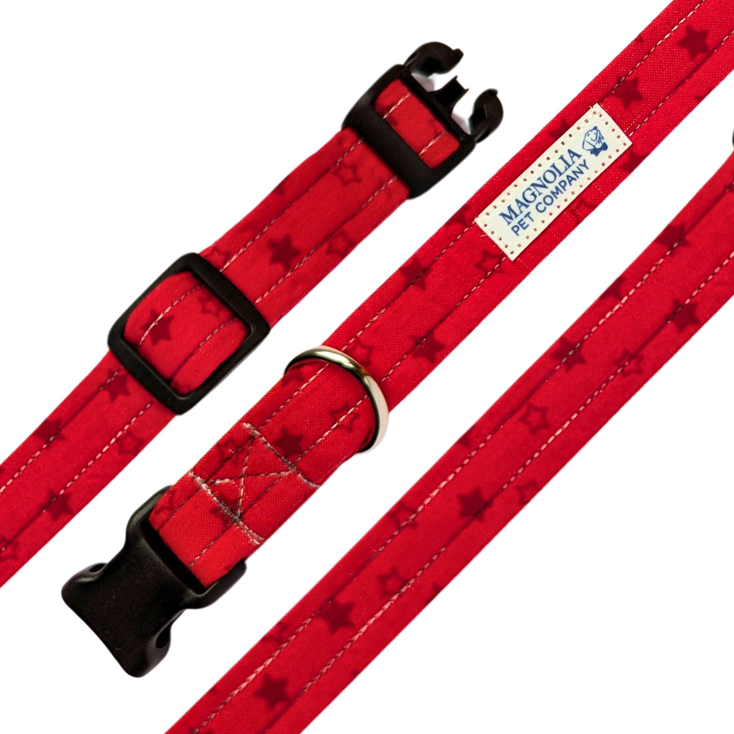 vibrant red collar is adorned with subtle dark grey and black stars, creating a sophisticated and eye-catching design