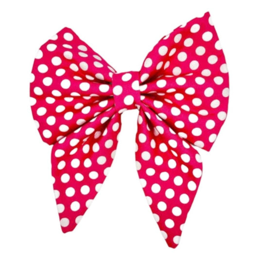 Our Bodacious Pink Large Polka dot Dog Bow features a crisp white polkadot pattern against a vibrant pink background. Handmade in the USA