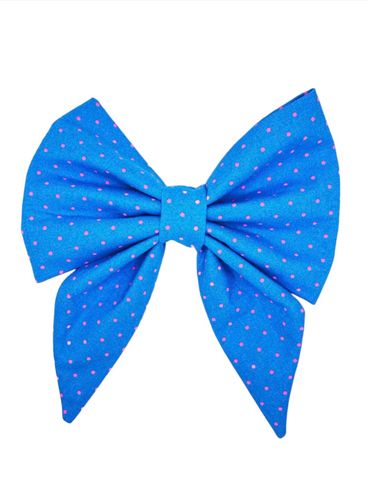 bright blue dog bow adorned with petite pink polka dots