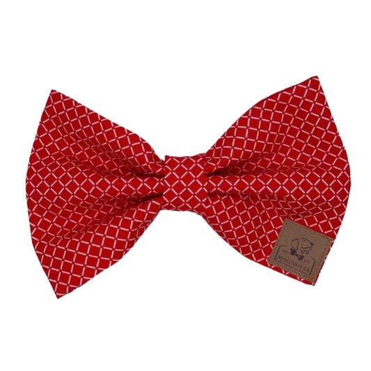 This exquisite dog bow tie features a striking red background adorned with crisp white diamond shapes, creating a sophisticated and eye-catching pattern that's perfect for any occasion