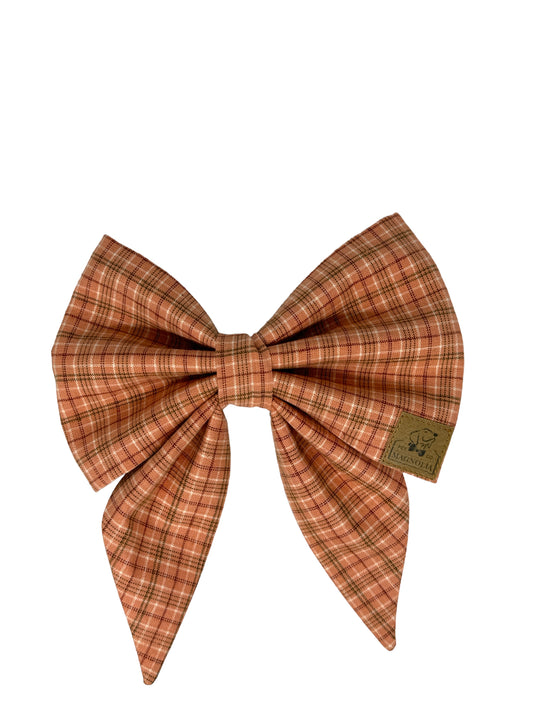 Add a touch of timeless elegance to your furry friend’s wardrobe with our Classic Plaid Dog Bow in Umber and Chocolate Brown. This sophisticated accessory combines rich umber tones with deep chocolate brown in a striking plaid pattern, perfect for any occasion where your dog needs to look their best.