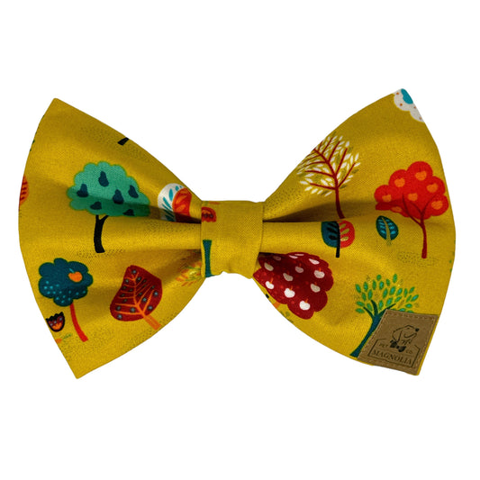 Autumn is calling with our Tuscan Gold dog bow tie featuring jewel toned leaves and apple trees on a tuscan gold background with flecks of shimmering gold. Handmade in the USA.
