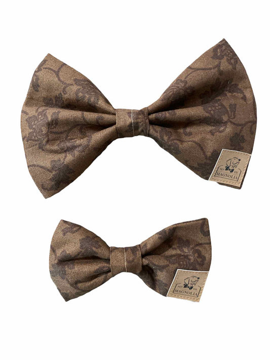 Java Jacquard Dog Bow Tie – a sleek and sophisticated accessory that adds a touch of class to your pup's attire.  Crafted with precision and style, this bow tie features a beautiful floral jacquard pattern in rich java tones, exuding elegance and refinement.
