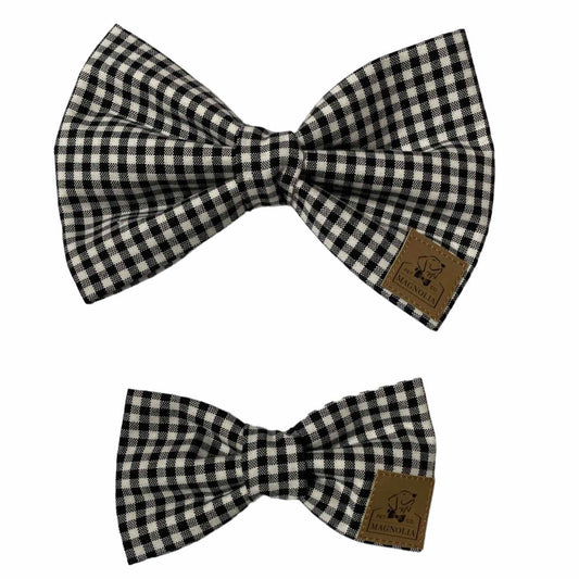 Upgrade your pup's style today with our Black and White check Gingham Bow Tie. This classic pattern is perfect for all occasions. Handmade in the USA
