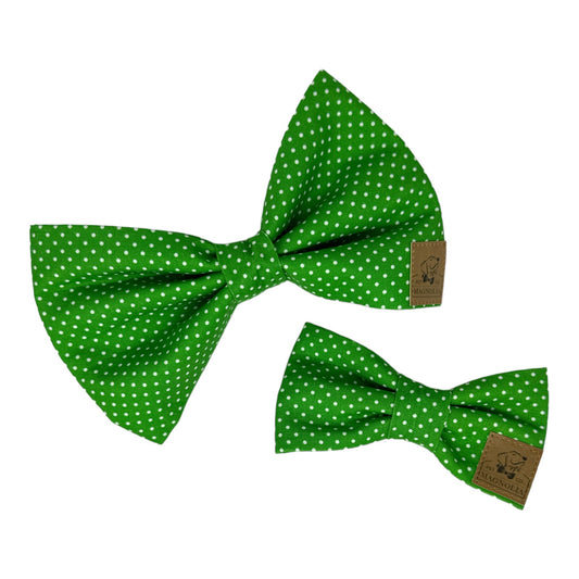 Featuring a fresh green background sprinkled with petite white polka dots