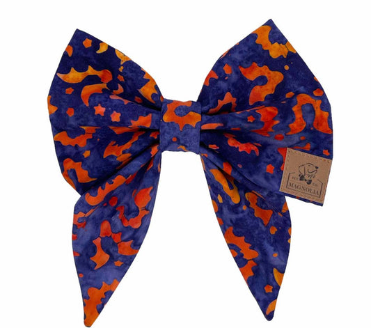 Featuring a dark blue background adorned with bright orange bats