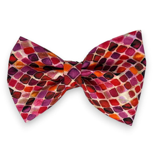 Dog bow tie featuring a rich pomegranate color and an intricate diamond mosaic design. - Magnolia Pet Company