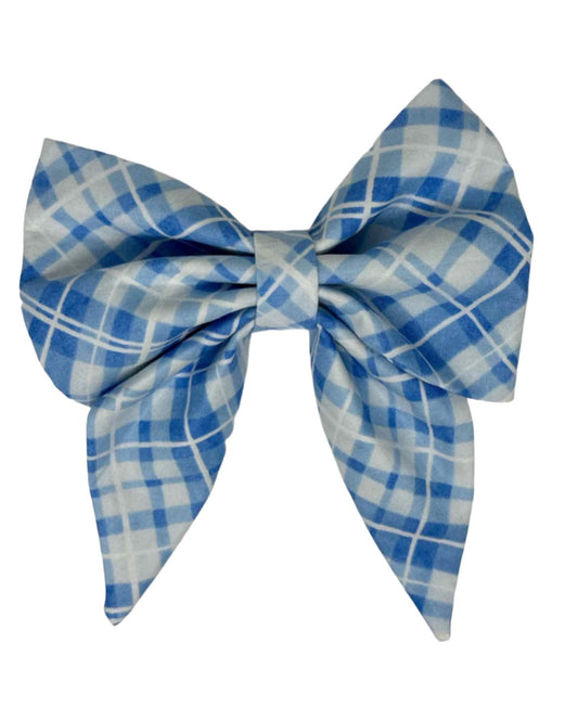 Dog Bow featuring classic sky blue madras plaid fabric, this bow exudes a timeless, preppy charm that’s perfect for any occasion. Magnolia Pet Company