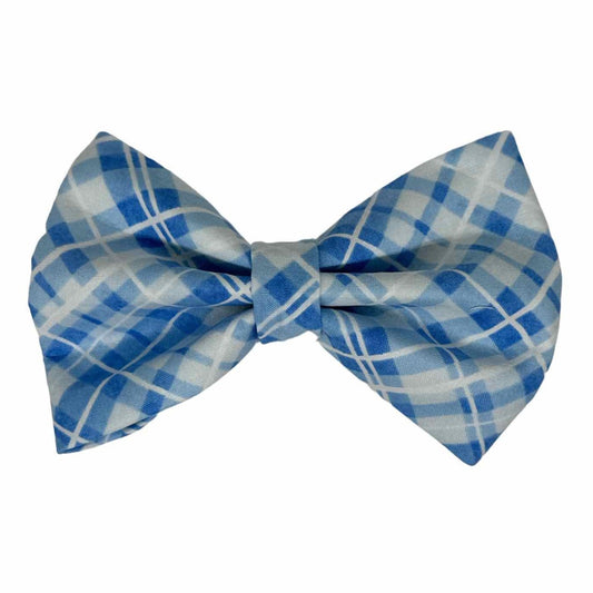 Dog bow Tie featuring classic sky blue madras plaid fabric, this bow exudes a timeless, preppy charm that’s perfect for any occasion by Magnolia Pet Company.