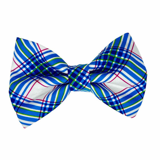 Dog bow tie featuring a classic blue tartan plaid accented with vibrant hot pink highlights, this bow seamlessly blends tradition with a modern twist.