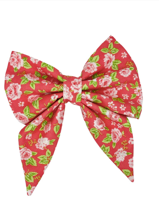 Embrace the essence of elegance and grace with our Vintage Rose on a bright pink background, a charming accessory that adds a touch of romance and sophistication to your canine companion's attire. Featuring delicate pink roses blooming against a vibrant pink fabric background, this bow is a timeless symbol of love and beauty. 