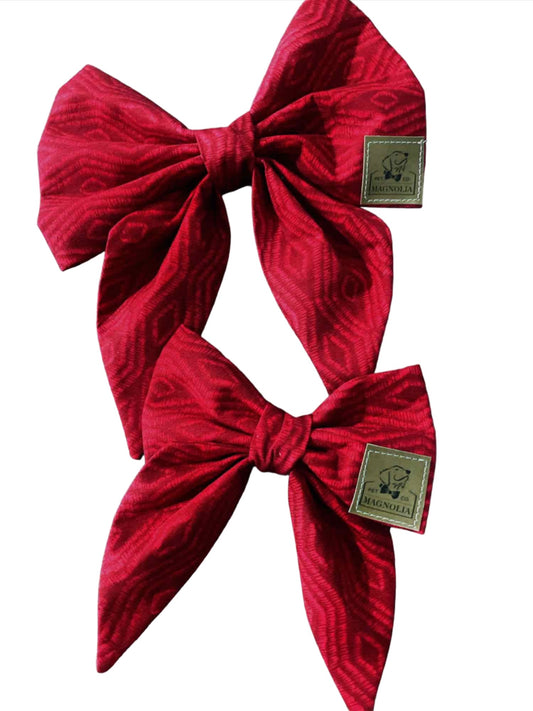 features a bright red fabric with faint lines that add texture and dimension
