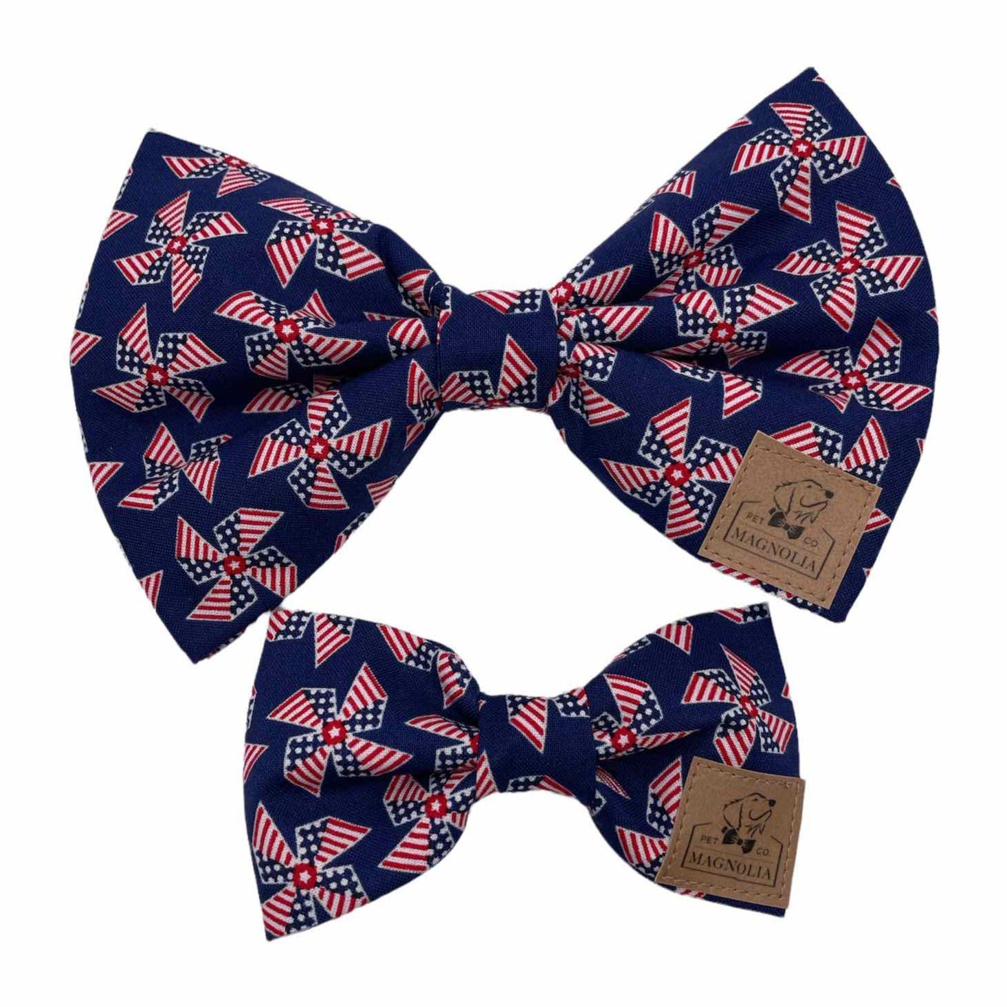 This striking Patriotic Pinwheel Dog Bow Tie features cute American flag pinwheels set against a rich navy background. Handmade in the USA.