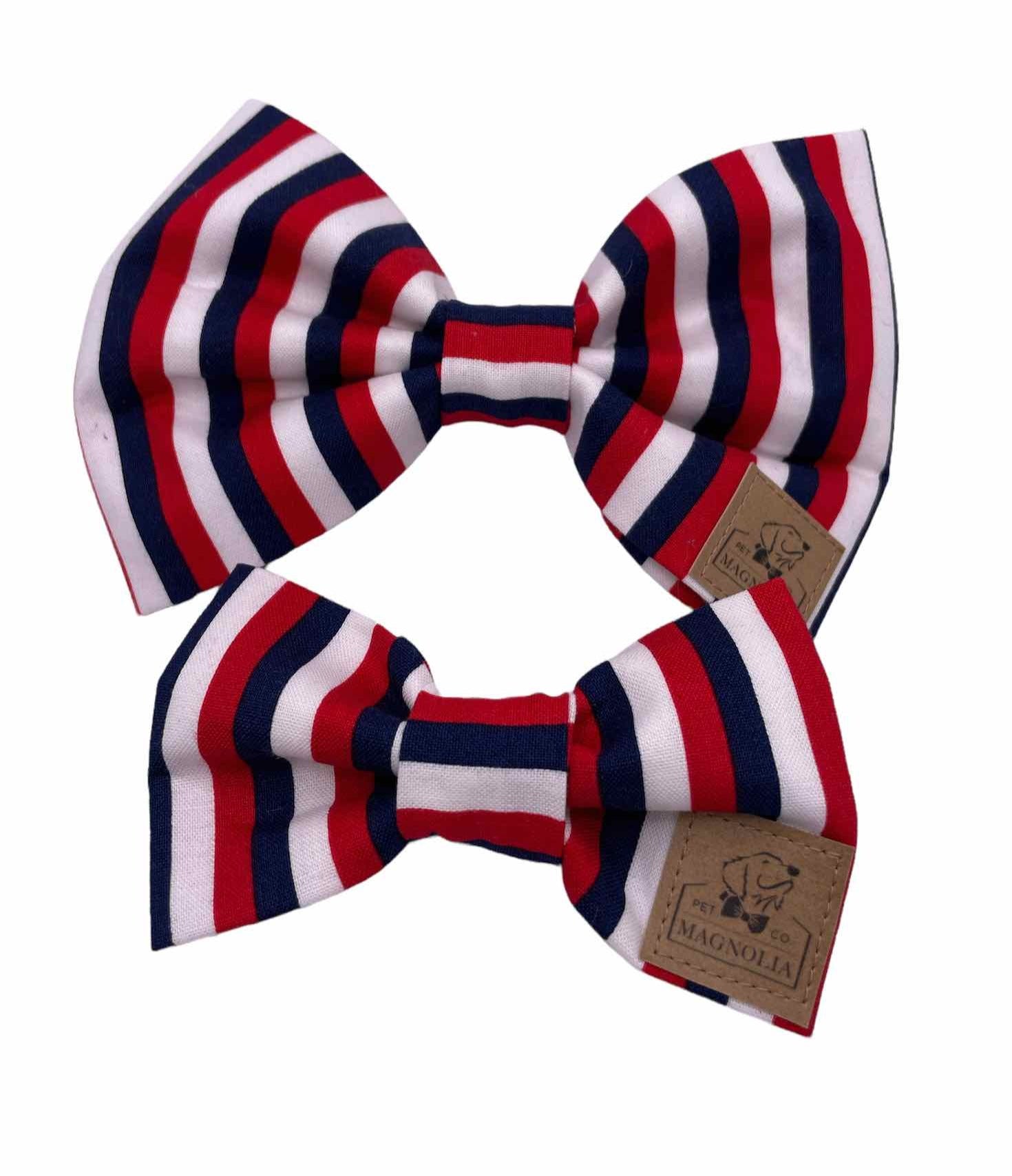 Show off your patriotic pride with our Red, White, and Blue Striped Dog Bow Tie. Handmade in the USA.